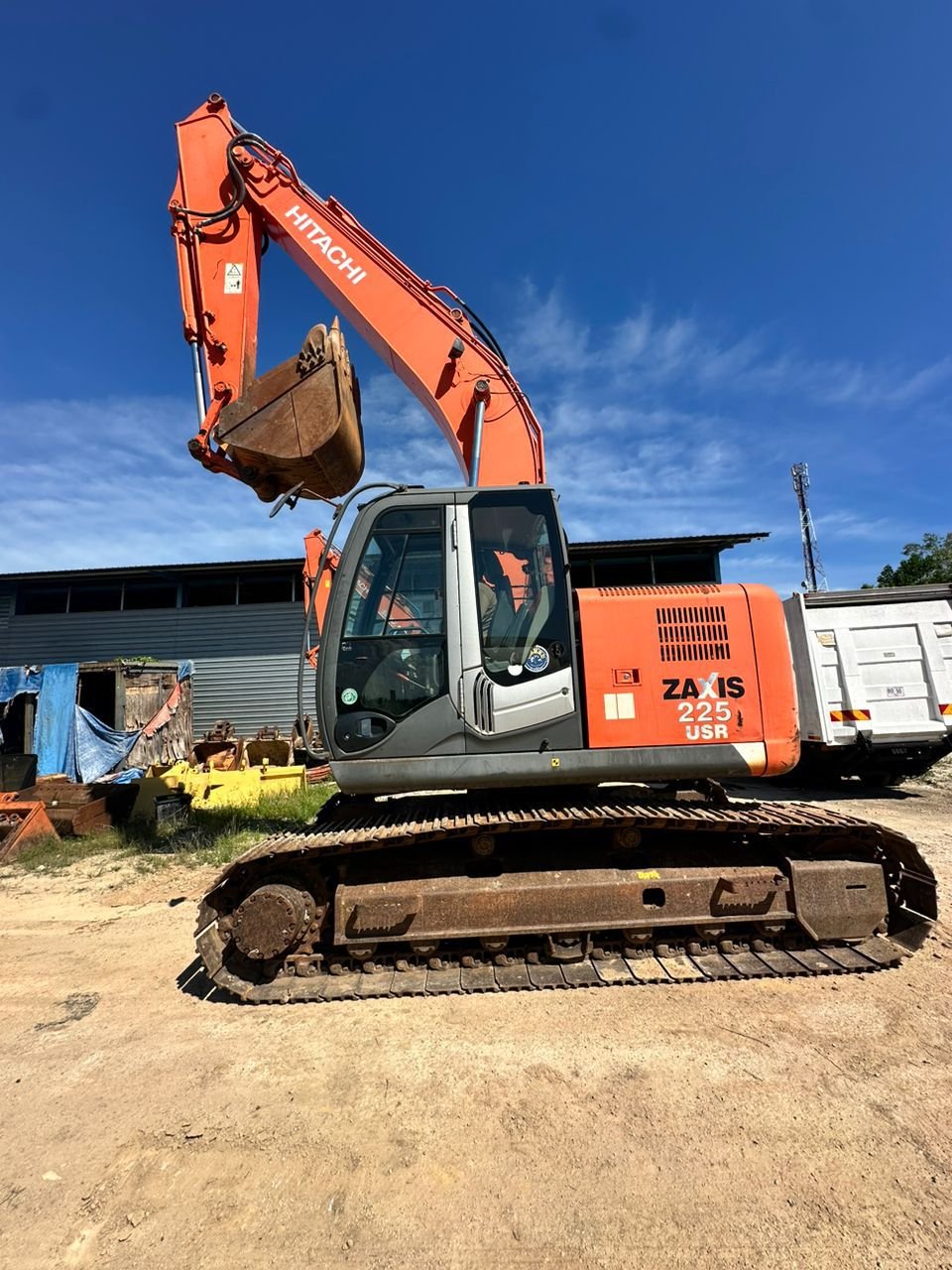 Hitachi ZX225USR-3 short tail excavator rental in Johor – working view