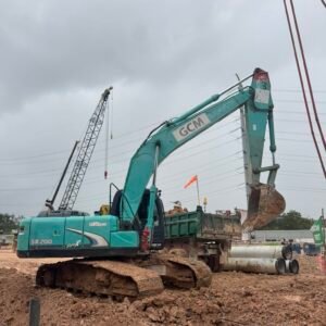 Kobelco SK200 excavator rental in Johor Unit E working on site