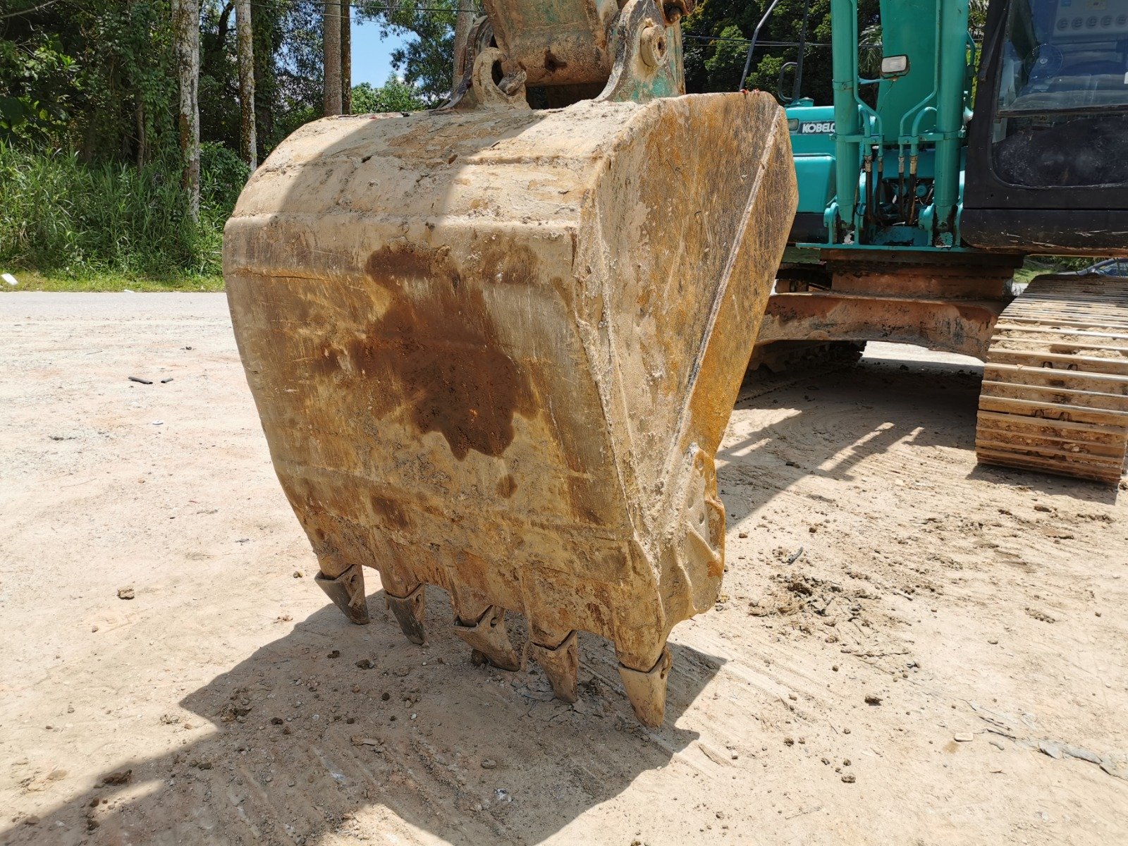 Kobelco SK200 excavator rental in Johor – multiple working views