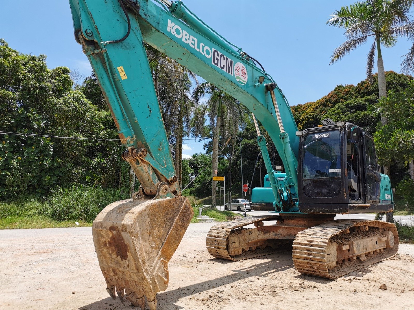 Kobelco SK200 excavator rental in Johor – multiple working views