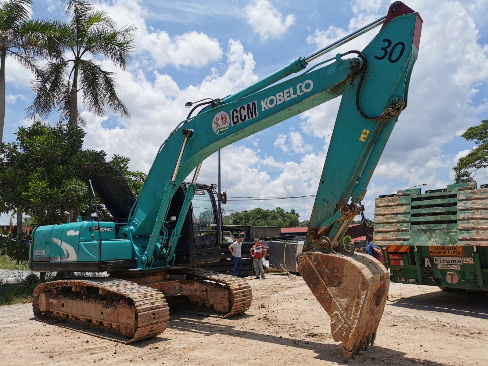 Kobelco SK200 excavator rental in Johor – multiple working views