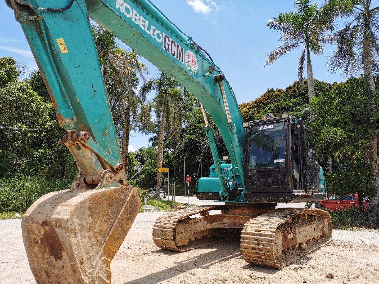 Kobelco SK200 excavator rental in Johor – multiple working views