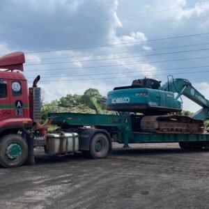 Low loader truck for heavy machinery transport across West Malaysia