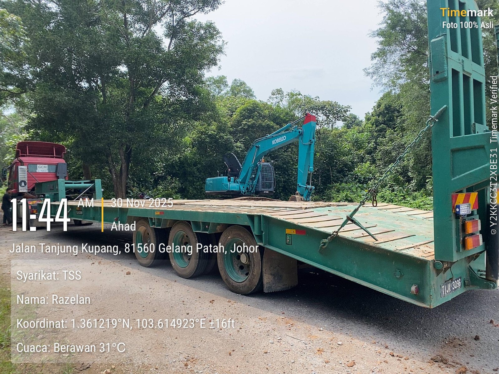 Low loader truck for heavy machinery transport across West Malaysia